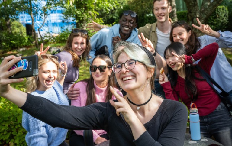 Students taking a group selfie